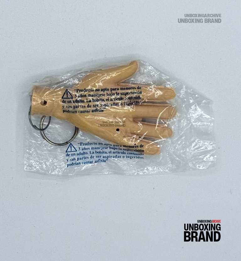 Manita Danup llavero promocional en bolsa con advertencia de asfixia, 2007